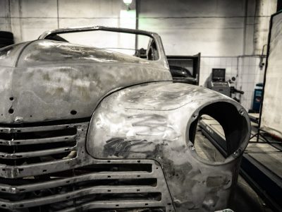 grey vintage car in garage