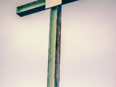 brown wooden cross with cross