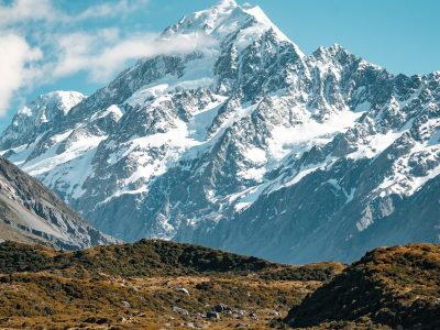 snow covered mountain under blue sky during daytime